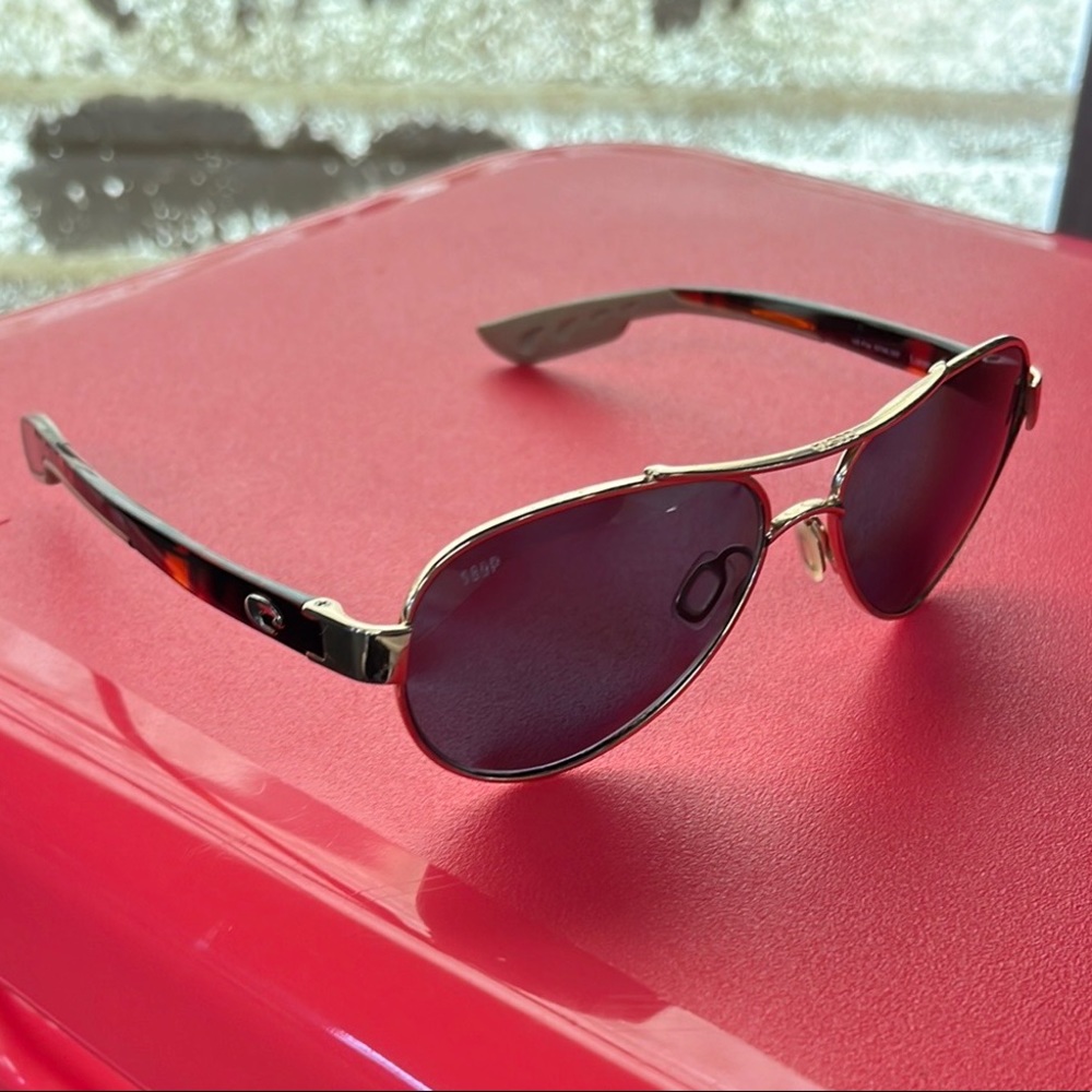 Costa Del Mar womens 580p polorized sunglasses, worn three times.